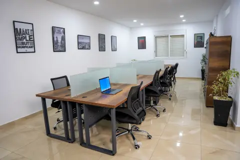 Open space desks and collaboration area